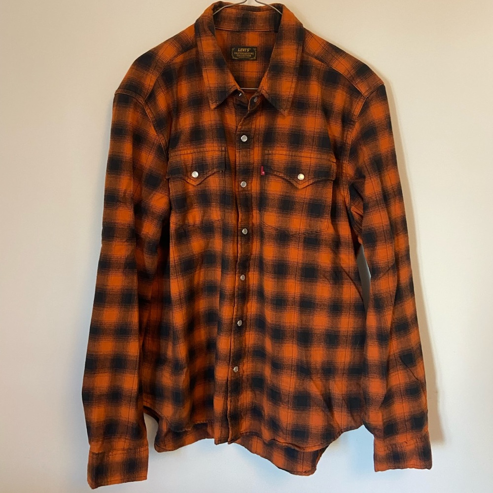 Levi’s skateboarding button up shirt.